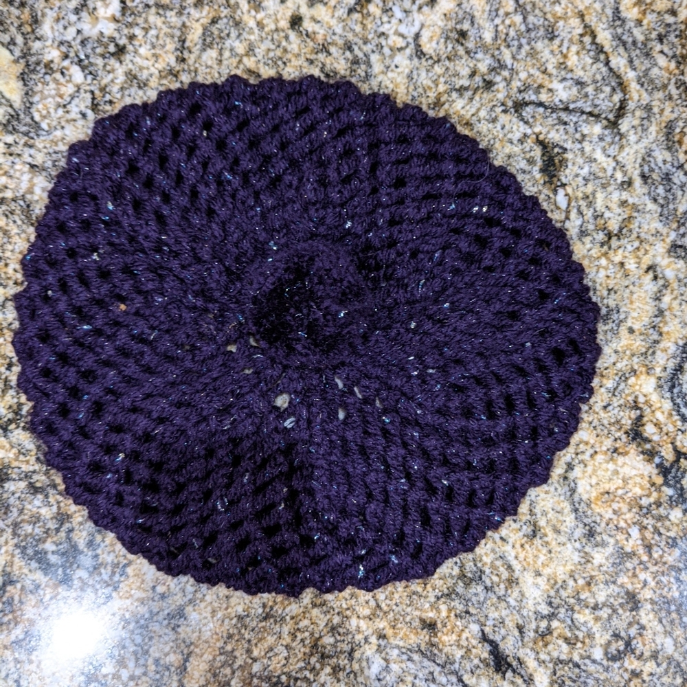Purple knitted baret hat